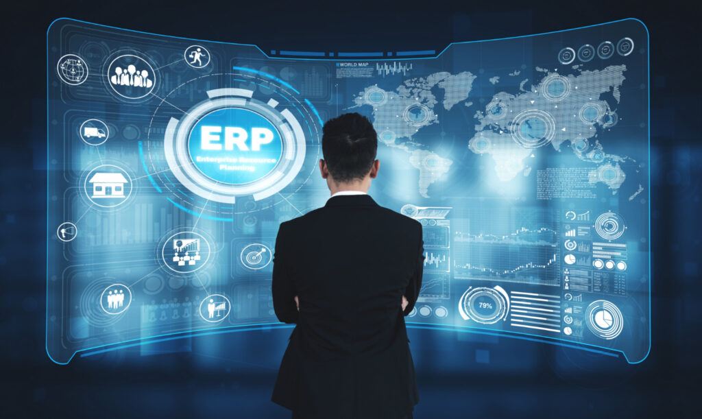 business man uses ERP system to manage company